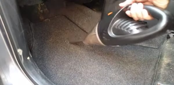 Vacuum cleaning of vehicle